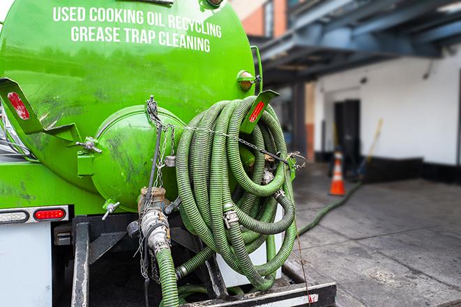 a large grease trap being pumped by a specialist in Aliso Viejo, CA